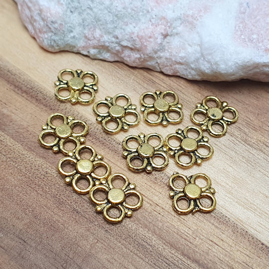 10 kleine Verbinder Blümchen, 10mm, antik goldfarbig