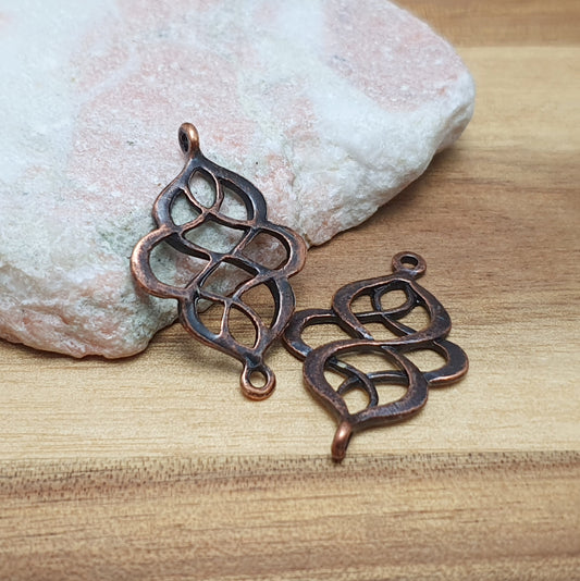 2 verschnörkelte Schmuckverbinder mit 2 Ösen, 28 x 18mm