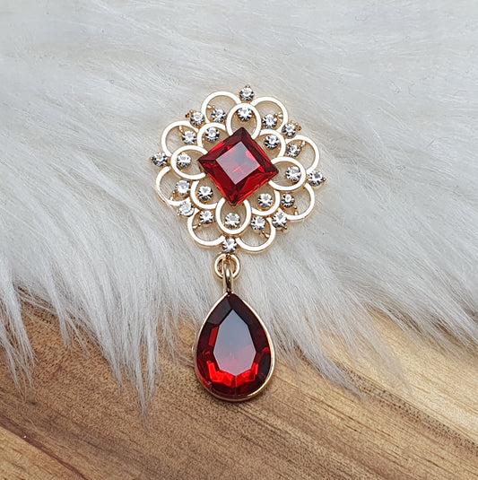 Zierelement mit Schmucksteinen und Strass, Vergoldet, siam