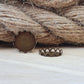 Cabochonwanne mit Bogenkante aus Messing in antik bronzefarbig, passend für runde Cabochons 14mm,