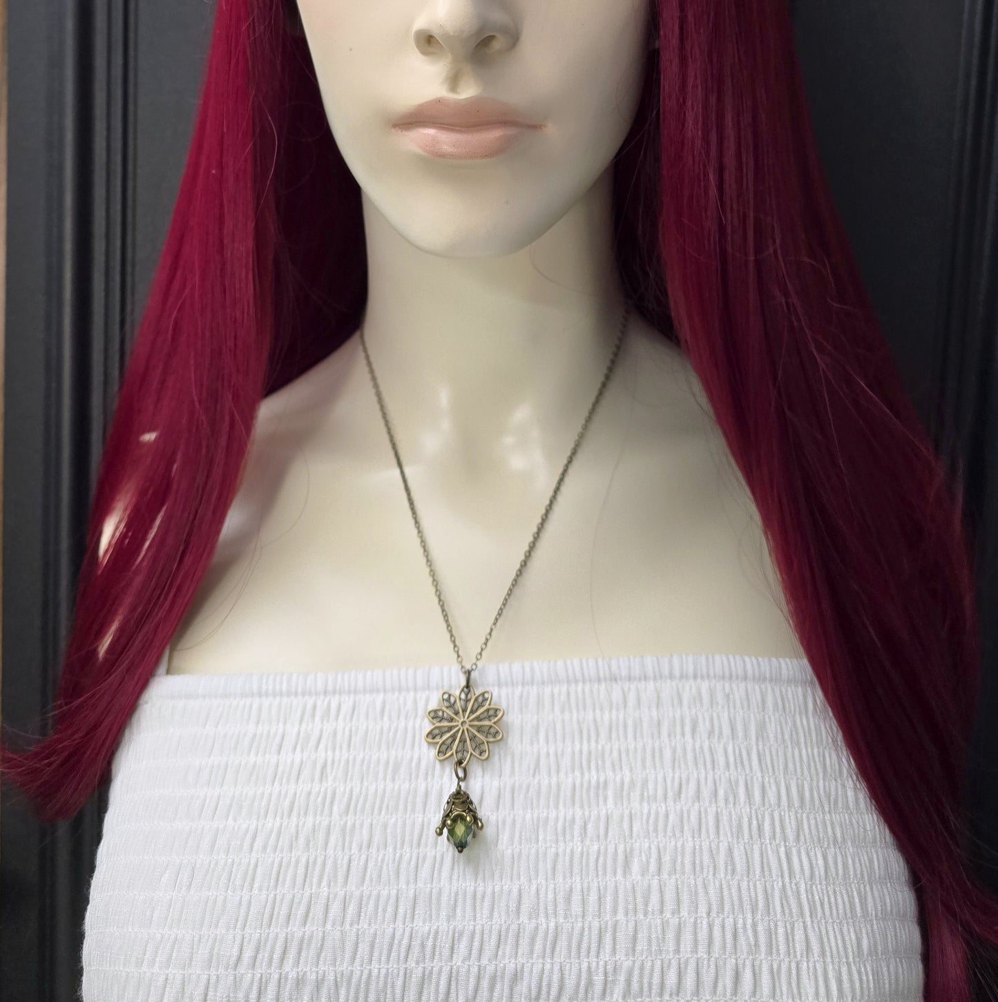 Kette mit Anhänger Sternblume und Kristallglasknospe im Vintage-Stil, antik bronzefarbig