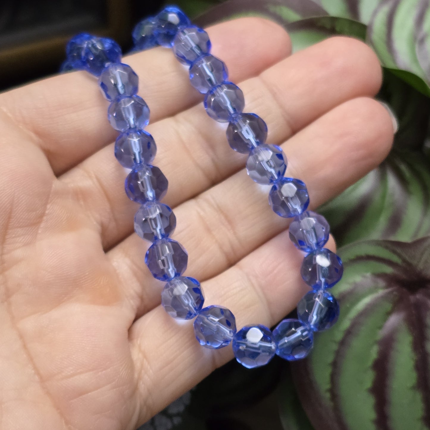 1 Strang facettierte Glasperlen, transparent blau, 8mm