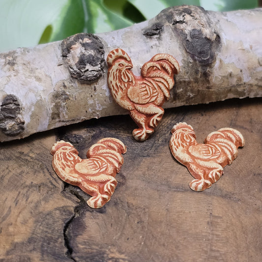 Das Bild zeigt Flatbacks Hühner – 23 x 18mm – Antik-Look – Charmante Akzente für deine DIY-Projekte