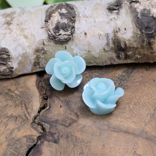 Das Bild zeigt 2 Cabochons Rose – 14mm – Mint – Frische Akzente für deine Schmuckkreationen 🌿🌹