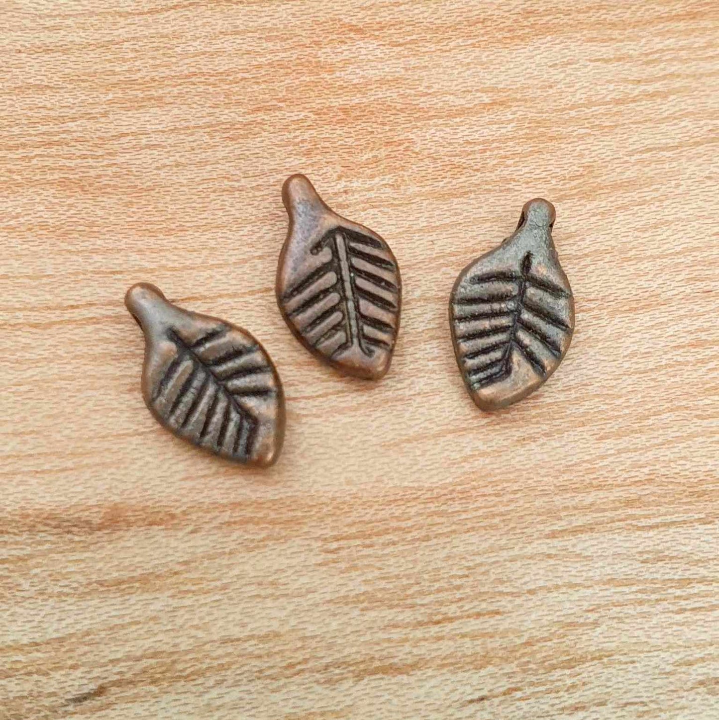 3 Metallperlen/Anhänger Blatt in antik kupferfarbig, 11x6mm