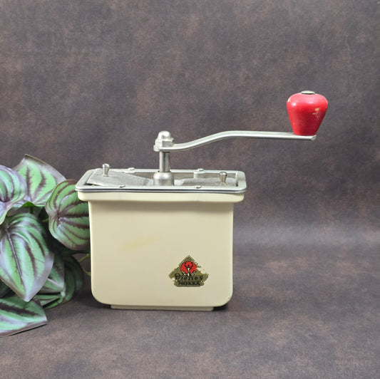 Dienes Handkaffeemühle aus den 1950er-Jahren mit Bakelit-Knauf, Holzgehäuse und funktionsfähigem Mahlwerk.