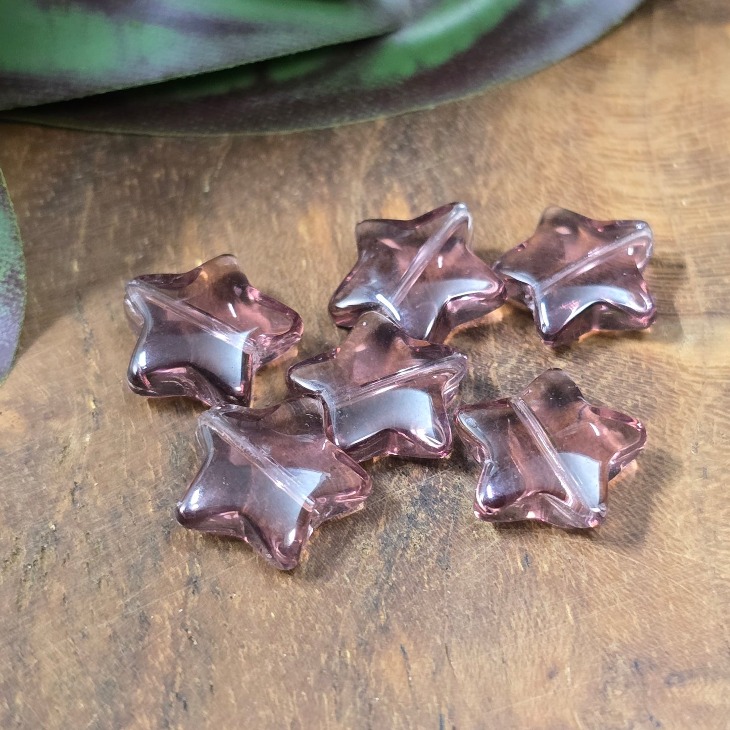12 Glasperlen in Sternform, ca. 11 mm, transparent & glänzend – ideal für DIY-Schmuck & kreative Bastelideen. Amethyst
