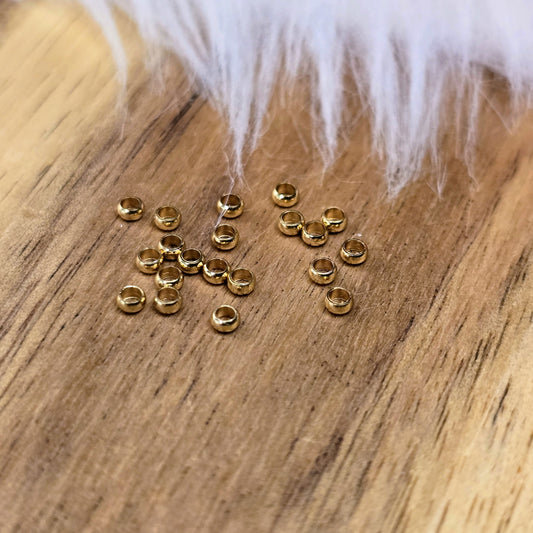 Goldfarbene Crimps aus Edelstahl (2 mm) im 20er-Set – perfekt zum Fixieren von Perlen & Verschlüssen in Schmuckprojekten. Robust, präzise & ideal für feine Designs.