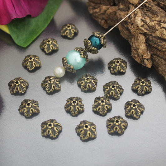 20 Perlenkappen/Zierkappen gerüschtes Blattwerk, mit Antikfinish, 9mm
