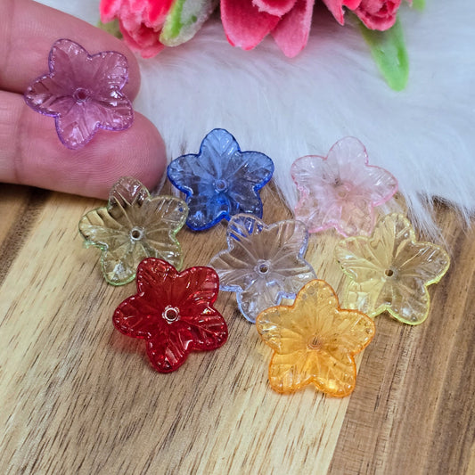 Das Bild zeigt zauberhafte Blumenperlen! Ihre transparent glänzende Oberfläche macht sie zum perfekten Accessoire für eine Vielzahl von Anwendungen.