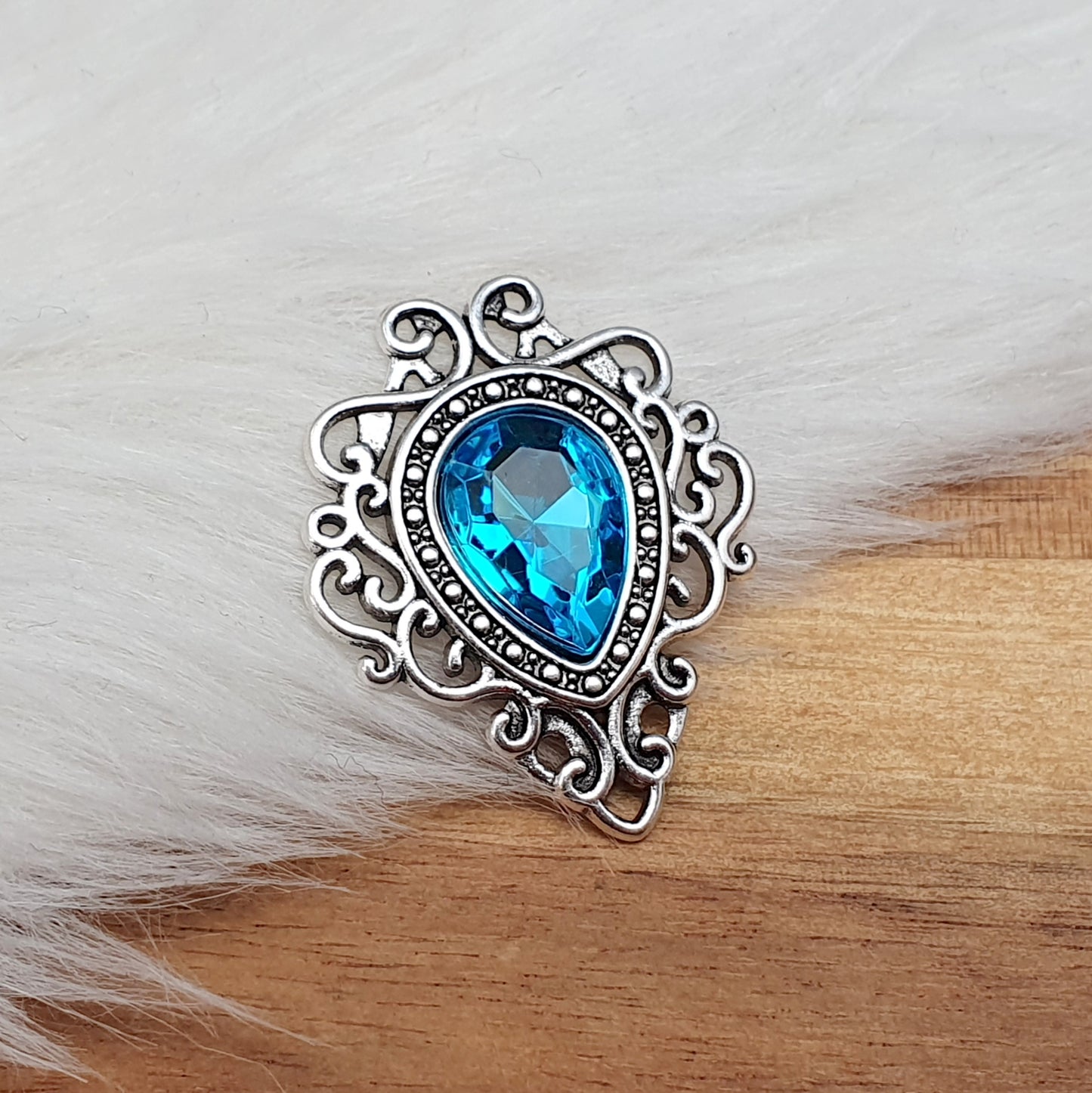 Zierelement silberfarbig, Schnörkel, Schmuckstein, 32x26mm