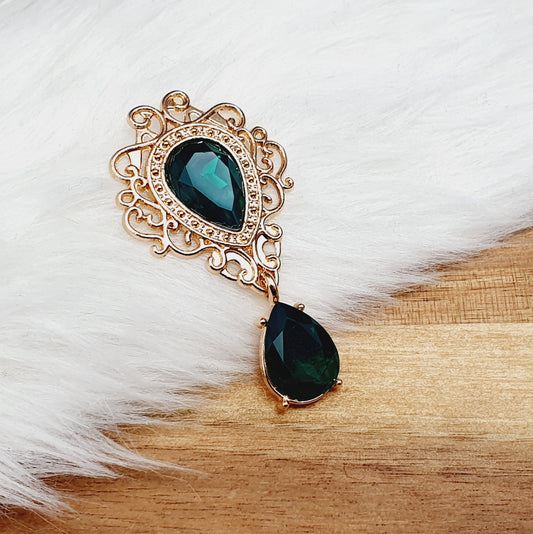 Verschnörkeltes Zierelement mit Schmuckstein, 48 x 26mm