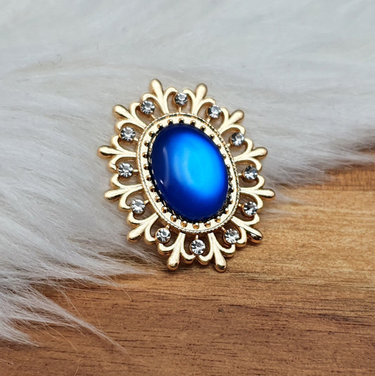 Vergoldetes Zierelement mit Strass & Cabochon, Moonstoneoptik, 29x25mm