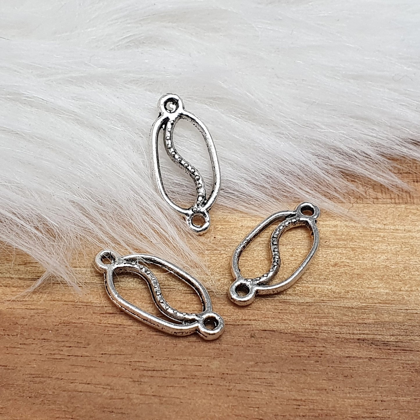 4 Verbinder, Oval mit Welle, 19mm, antik silberfarbig, Schmuck Basteln