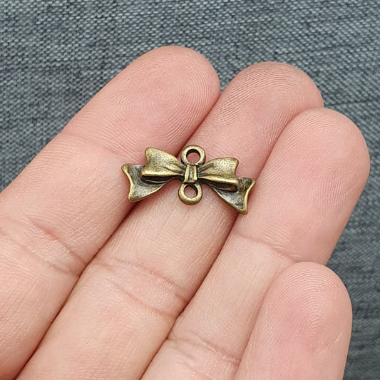 4 Verbinder, Schleife, 10mm, antik bronzefarbig, Schmuck Basteln