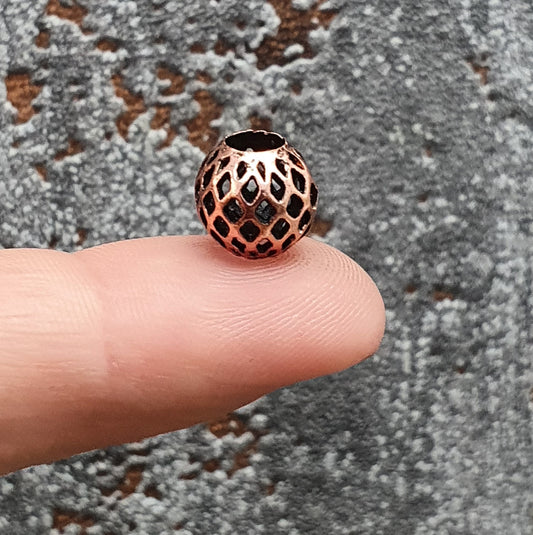 1x Groslochperle Netz, 9mm, antik kupferfarbig