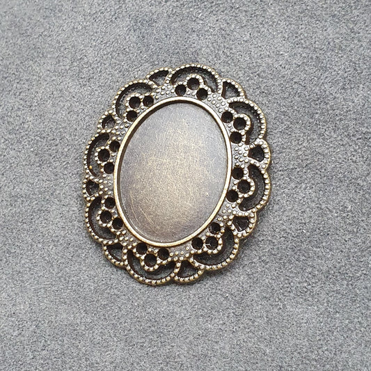 Schönes Zierelement für Cabochons, Oval 25x18mm, antik bronzefarbig