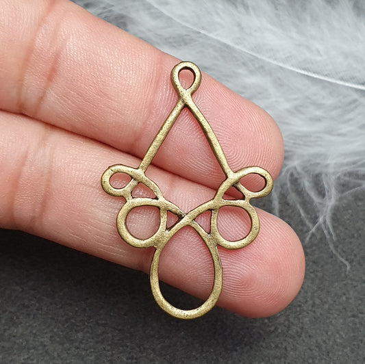 2 Verbinder Schnörkel, 38mm, antik bronzefarbig