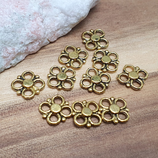 10 kleine Verbinder Blümchen, 10mm, antik goldfarbig