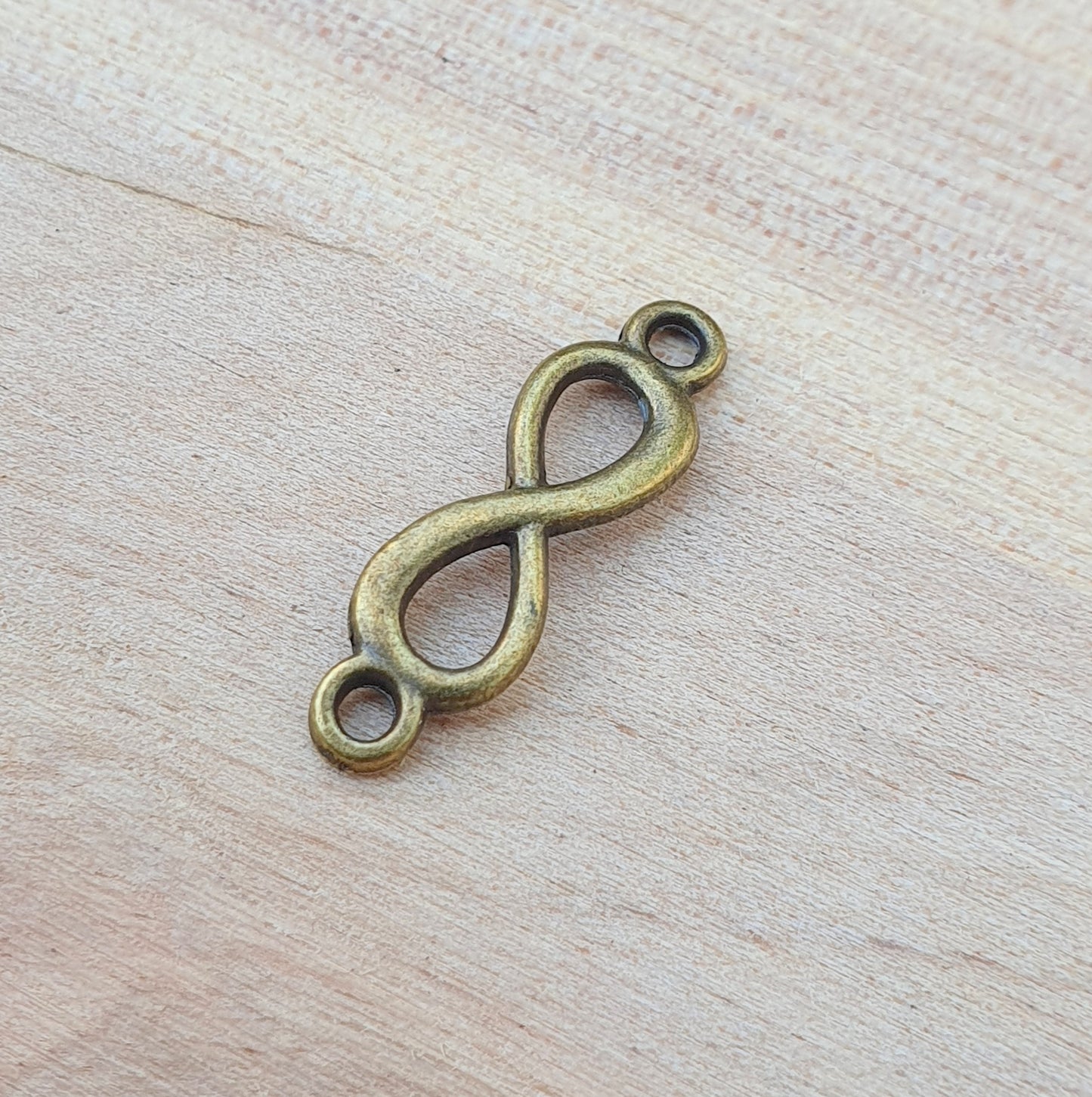 6 Verbinder Infinity, Unendlichkeit in antik bronzefarbig, 20mm