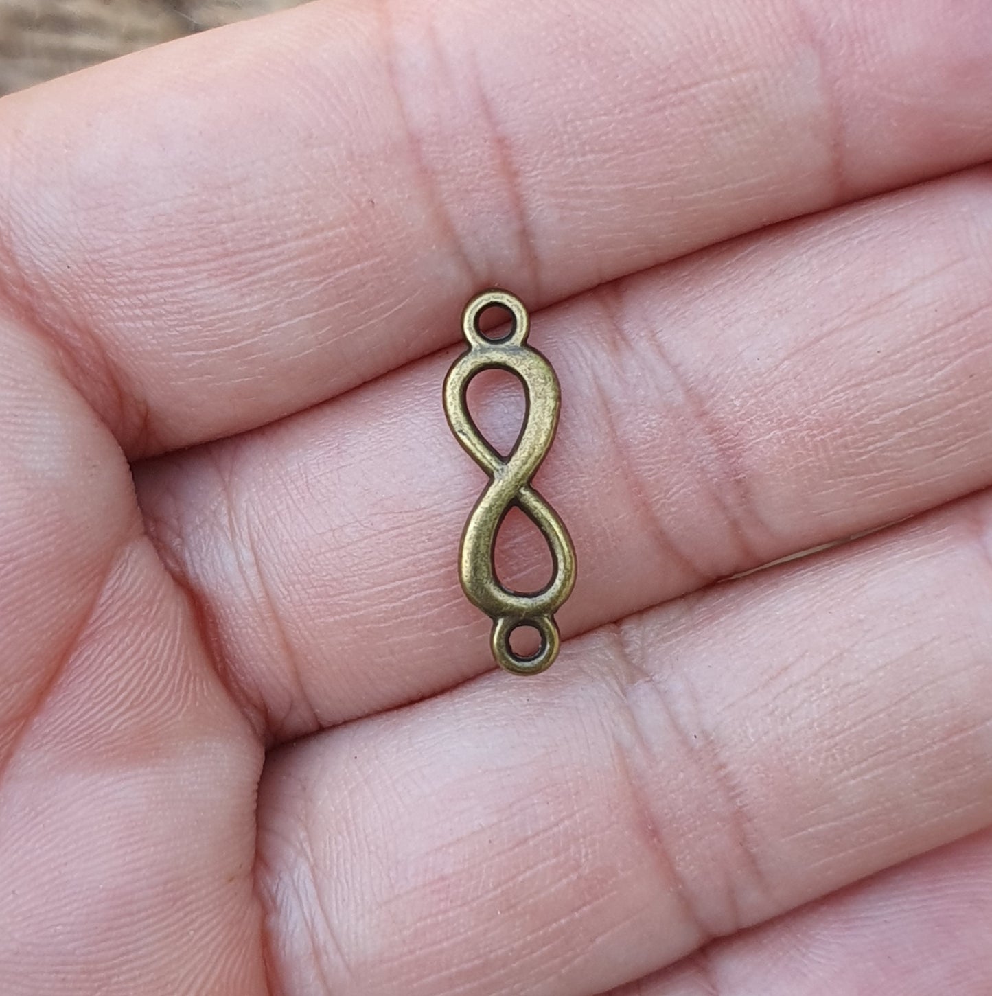 6 Verbinder Infinity, Unendlichkeit in antik bronzefarbig, 20mm
