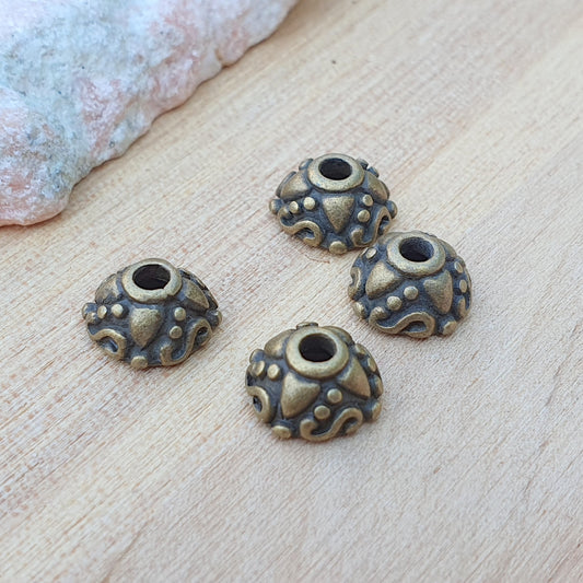 8 Perlenkappen 9mm, antik bronzefarbig