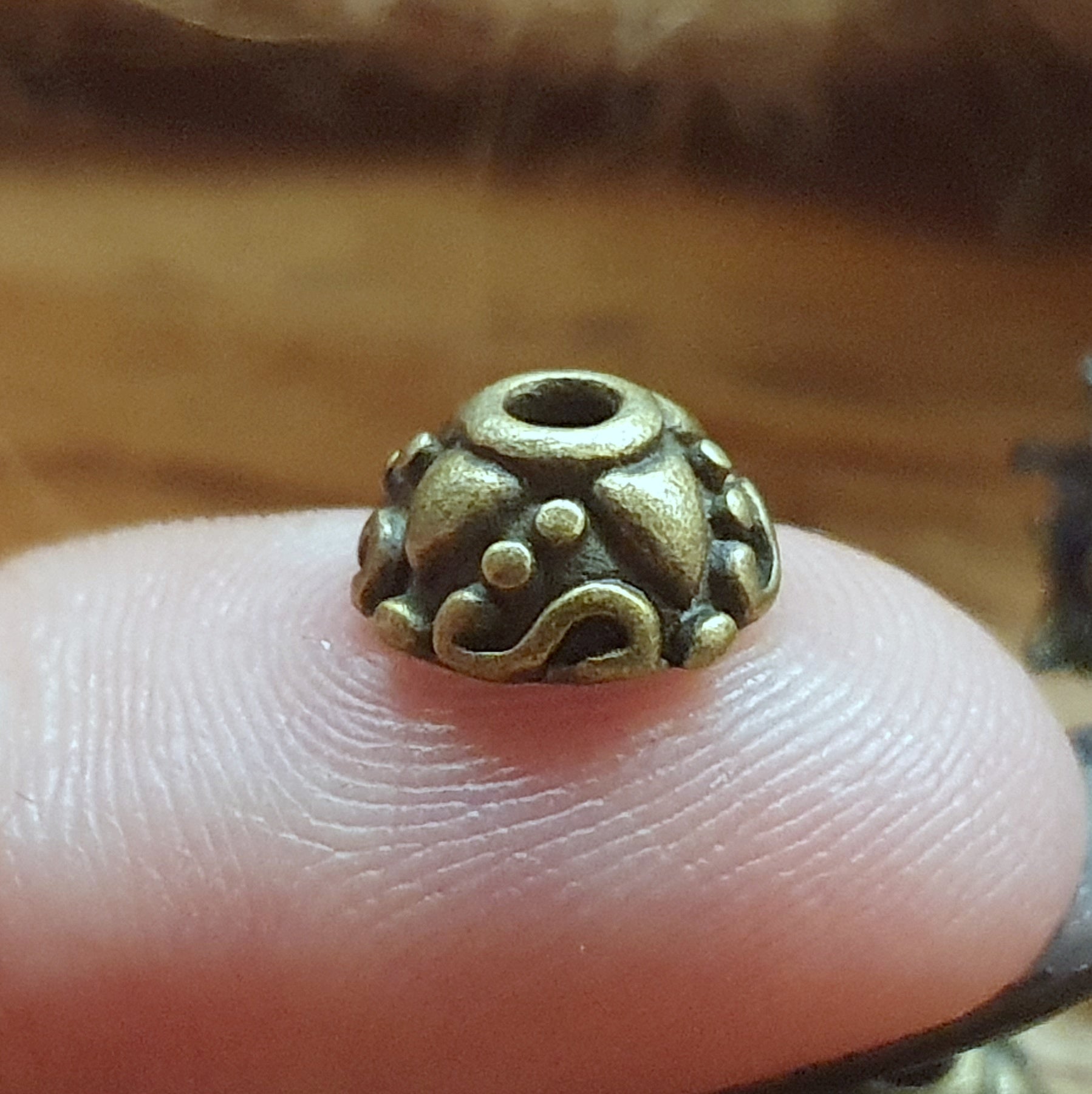8 Perlenkappen 9mm, antik bronzefarbig