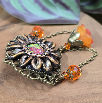 Brosche mit Sonnenblume aus Epoxy Clay, Nostalgie Design, Reversnadel, Anstecknadel, antik Bronze & Orange