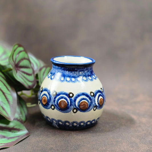 Original Bunzlauer Vase aus den 1970ern, bauchige Form, handbemalt. Blau-Braunes Dekor, kleiner Makel, sonst top erhalten – perfekt für Sammler & Deko.