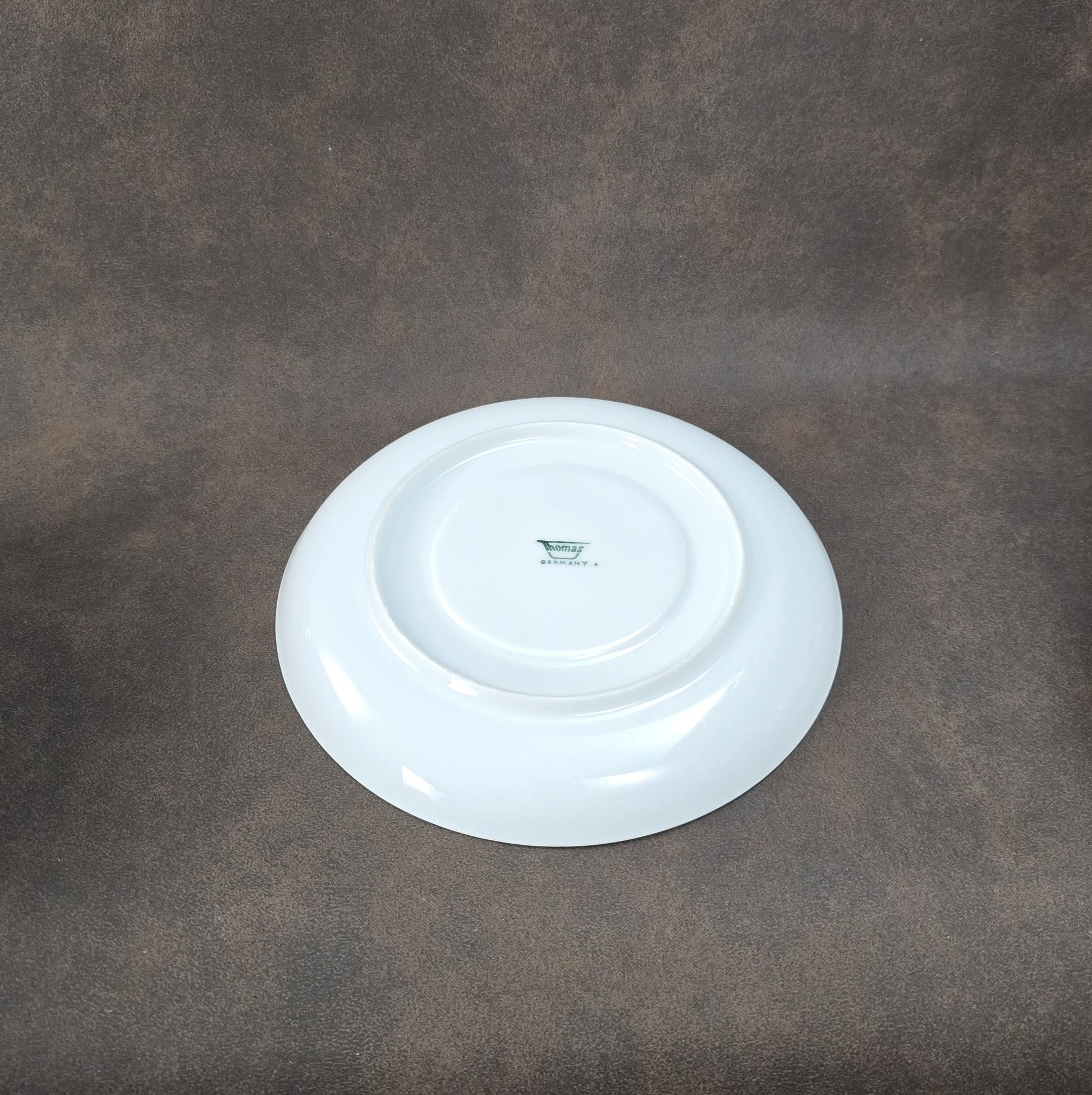 Zweier-Set Thomas Lanzette Saucieren aus den 1970ern mit Untertellern und kräftigem Pop-Art-Dekor in Orange.