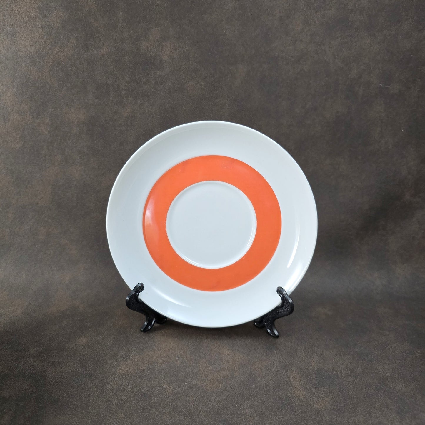 Zweier-Set Thomas Lanzette Saucieren aus den 1970ern mit Untertellern und kräftigem Pop-Art-Dekor in Orange.