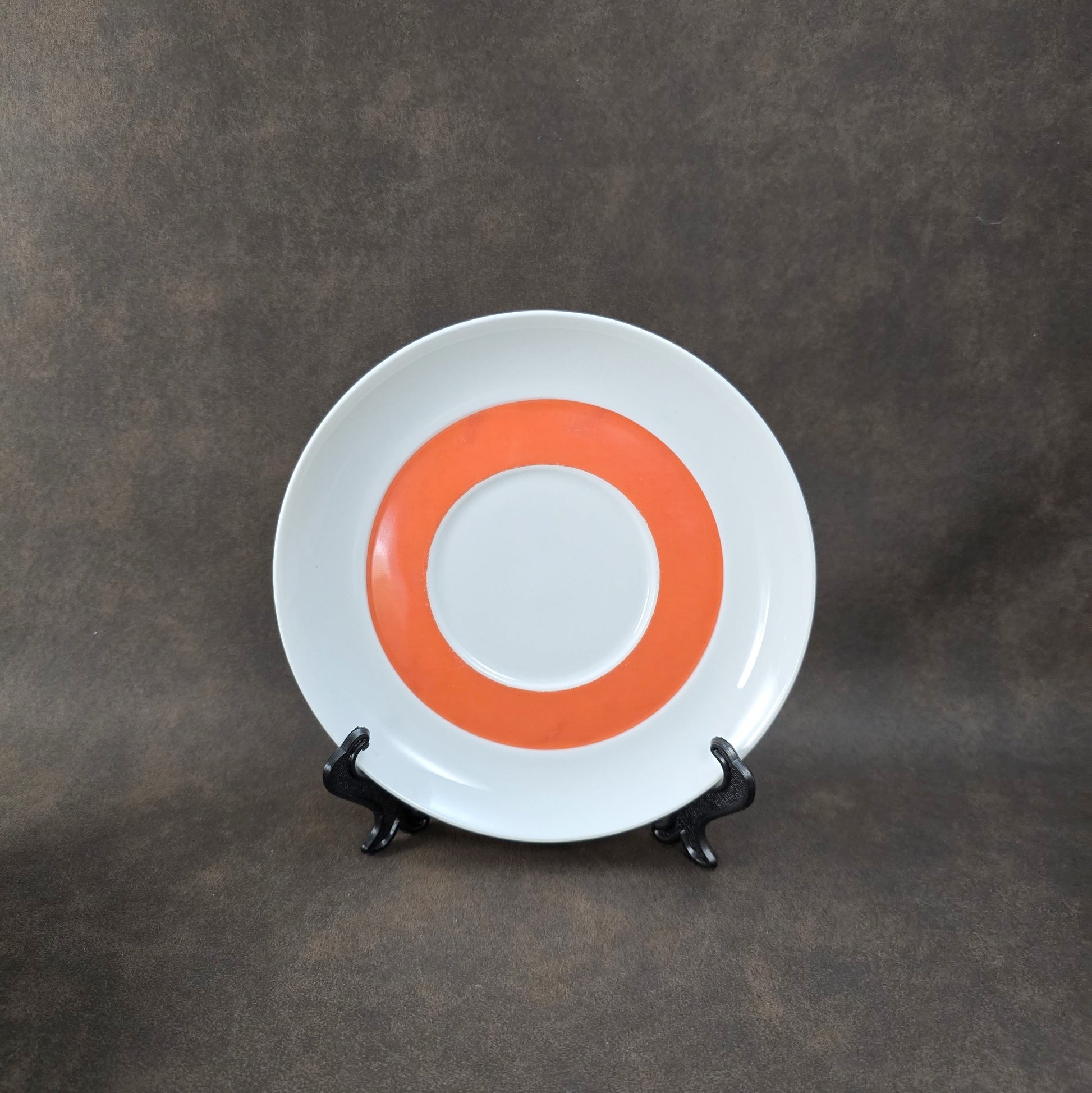 Zweier-Set Thomas Lanzette Saucieren aus den 1970ern mit Untertellern und kräftigem Pop-Art-Dekor in Orange.