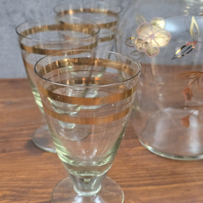 Elegantes Vintage-Likörset aus böhmischem Glas mit handbemalter Emailmalerei und Golddekor, 1950er–1960er Jahre, aus Haida, Tschechoslowakei.