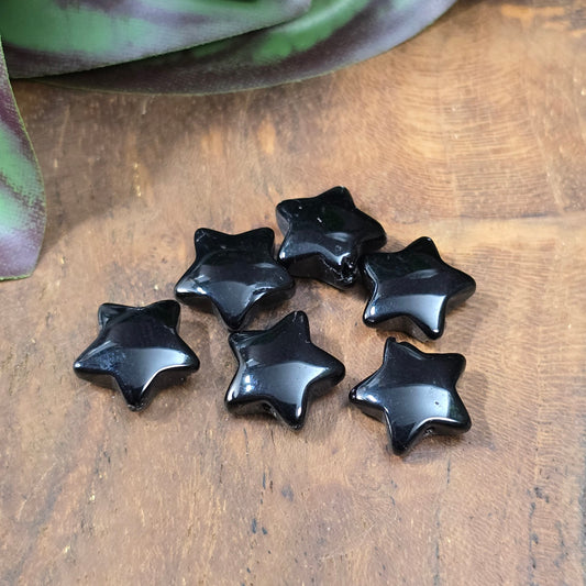 12 Glasperlen in Sternform, ca. 11 mm, transparent & glänzend – ideal für DIY-Schmuck & kreative Bastelideen. Schwarz