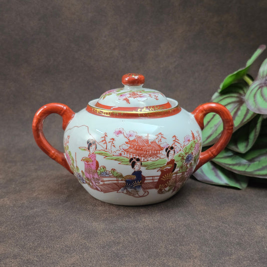 Wunderschöne japanische Vintage Zuckerdose mit Geisha-Motiv, Bambus-Optik und Goldverzierungen – stilvolle Ergänzung für Sammler, Vintage Küchen oder als originelles Geschenk.