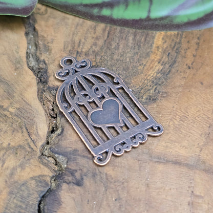 Romantischer Vogelkäfig-Anhänger 34mm aus antik kupferfarbener Zinklegierung mit Herz. Perfekt für Vintage-Schmuck, Ketten, Armbänder & DIY-Projekte.