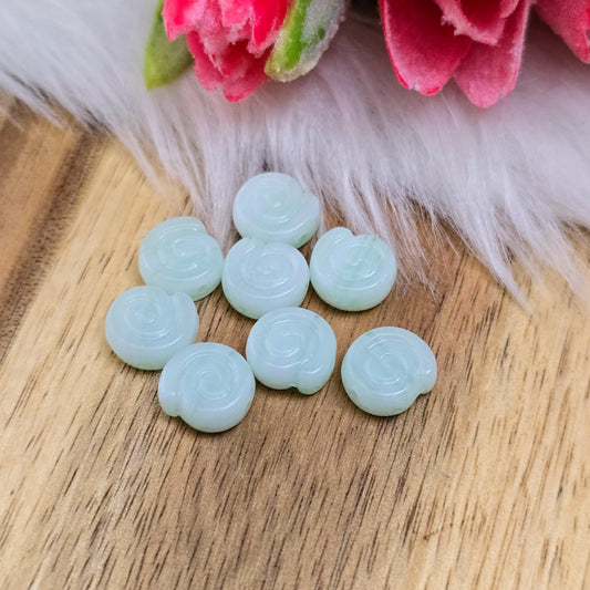 8 mintfarbene Schneckenperlen aus böhmischem Glas – ideal für zarte DIY-Schmuckideen wie Ketten, Armbänder oder Ohrringe. Größe: 9 x 4 mm – handgefertigte Qualität!