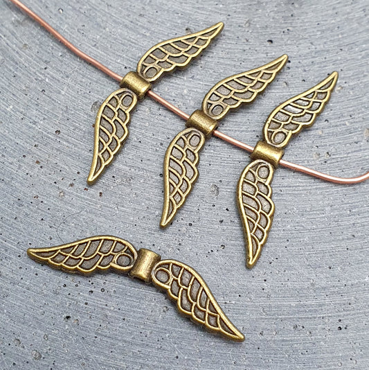 4 Metallperlen, Flügel, Engel, 32mm, antik bronzefarbig