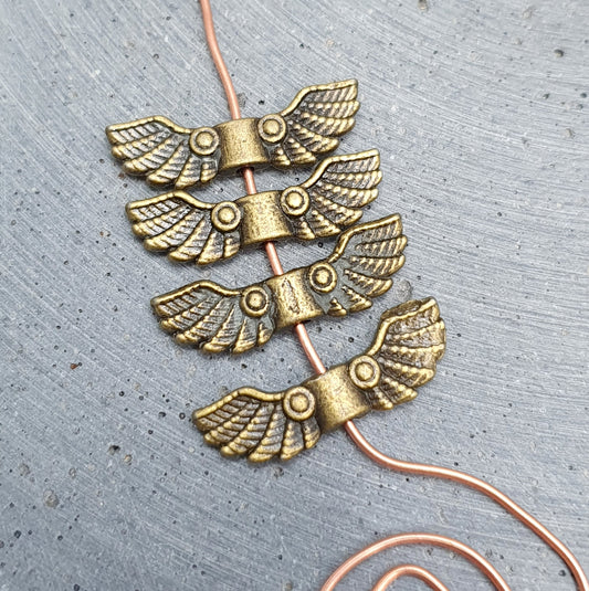 4 Metallperlen Flügel, Engel, 21mm, antik bronzefarbig