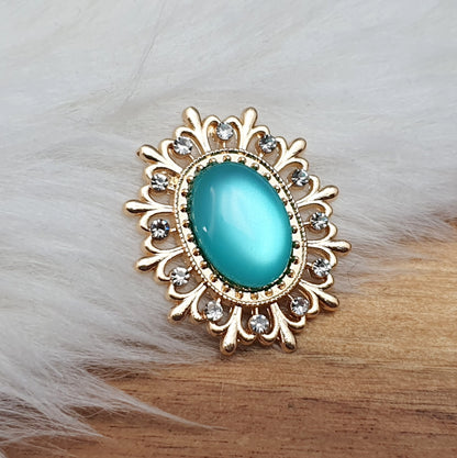 Vergoldetes Zierelement mit Strass & Cabochon, Moonstoneoptik, 29x25mm