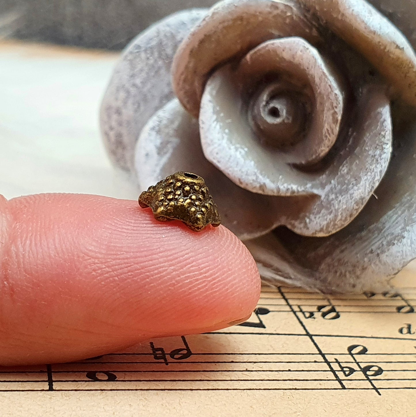 10 Perlenkappen, ø 6mm, antik bronzefarbig