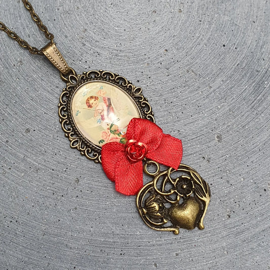 Kette mit Anhänger Cabochon Engel Cupid Rose Schleife